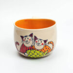 Lässige Keramik Tasse / Becher orange Katze mit Fisch