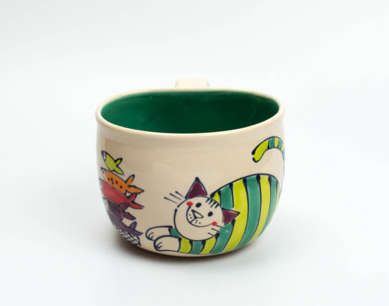 Lässige Keramik Tasse / Becher grün Katze mit Fisch